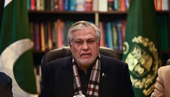 Finance Minister Ishaq Dar speaks during a press conference in Islamabad on February 10, 2023. — AFP