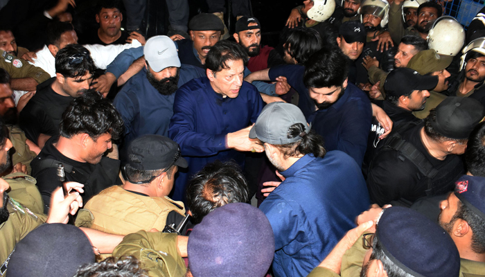 Pakistan Tehreek-e-Insaf (PTI) Chairman Imran Khan arrives at the Lahore High Court for a hearing on February 20, 2023. — Online/File