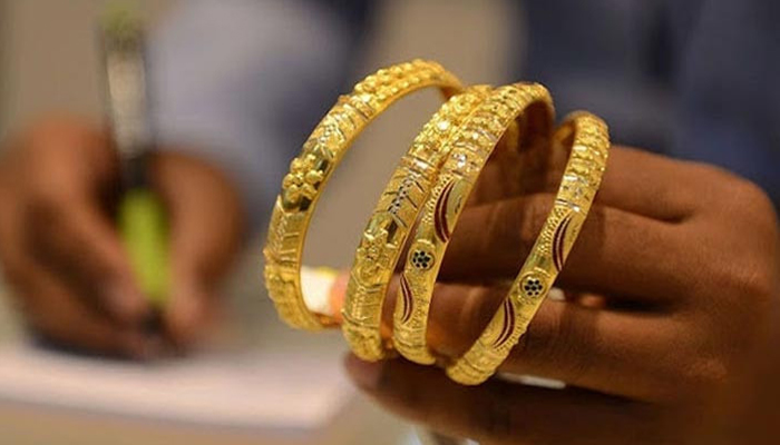 An undated image of gold bangles. — AFP