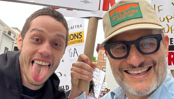Pete Davidson hands out pizzas at picket line after SNL debut falls through
