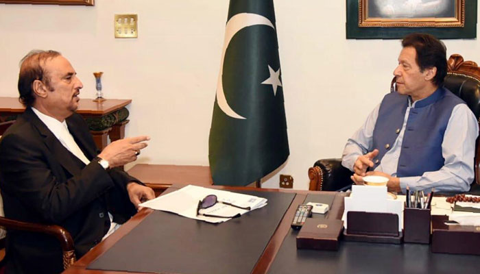 Pakistan Tehreek-e-Insaf (PTI) Chairman Imran Khan (R) and his lawyer Babar Awan (L). — Radio Pakistan/File