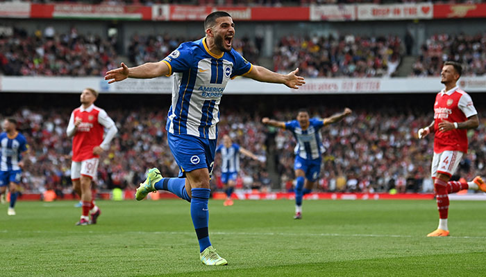 Brighton´s German striker Deniz Undav celebrates after scoring his teams second goal during the English Premier League football match between Arsenal and Brighton and Hove Albion at the Emirates Stadium in London on May 14, 2023.—AFP