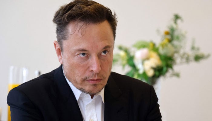 Tesla CEO'su Elon Musk, 15 Mayıs 2023'te Chateau de Versailles'da 6. Select France Zirvesi'nin oturum aralarında Fransa Ekonomi ve Maliye Bakanı ile bir araya geldi. — AFP