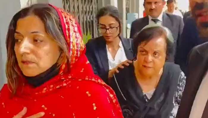 PTI Senator Falak Naz (left) and Senior Vice-President Dr Shireen Mazari leave the court premises after release on May 17, 2023, in this still taken from a video. — Twitter/@siasatpk