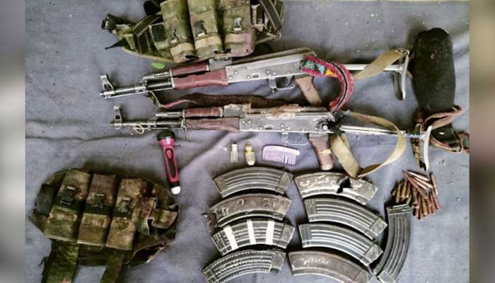 The militarys media wing releases photo of weapons and ammunition recovered from terrorists. — ISPR