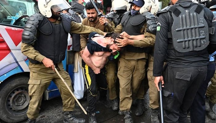 The government crackdown continues on the leaders and workers of the Imran Khan-led PTI across the country. — AFP/File