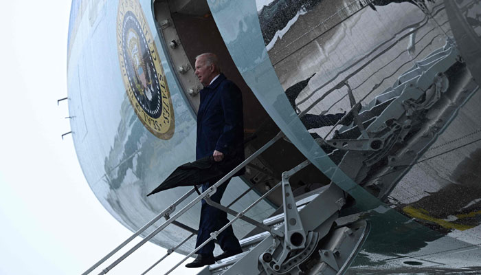 US President Joe Biden arrives to attend the G7 Summit at the US Marine Corps base in Iwakuni on May 18, 2023. — AFP