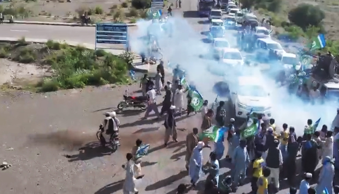 Smoke arises near JI chief's vehicle after suicide bomber attacks Sirajul Haq's convoy in Zhob, on May 19, 2023, in this still taken from a video. — Author