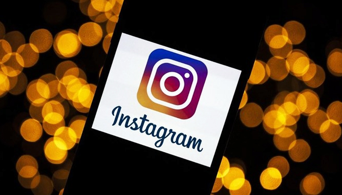 Instagrams logo can be seen on a mobile phone in this undated illustration. — AFP/File