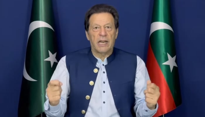 PTI Chairman Imran Khan addressing people during a broadcast in Lahore, on May 26, 2023, in this still taken from a video. — YouTube/PTI