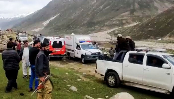 Rescue officials search for the avalanche victims in the Astore district in Pakistan’s northern Gilgit-Baltistan on May 27, 2023, in this still taken from a video. — Twitter/@iAliTajGB