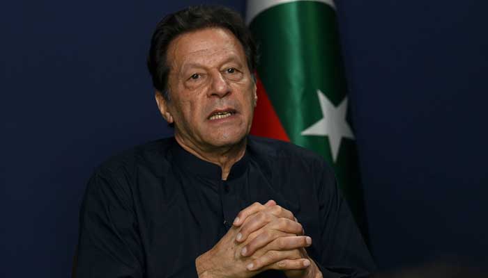 PTI chief Imran Khan speaks during an interview with AFP at his residence in Lahore on May 18, 2023. — AFP