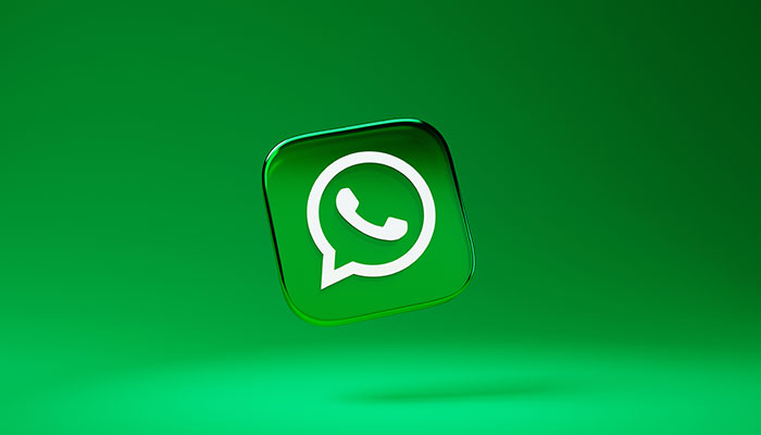 The picture shows a WhatsApp logo. — Unsplash