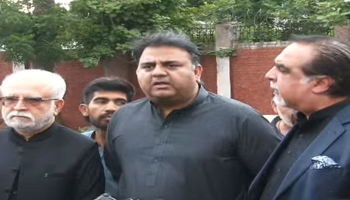 (From left to right) former Pakistan Tehreek-e-Insaf leaders Mahmood Moulvi, Fawad Chaudhry and Imran Ismail address a press conference outside Adiala jail on May 31, in this still taken from a video. — YouTube/Geo News/Live
