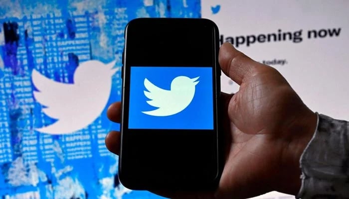 Twitter logo is seen on a phone. — AFP/File