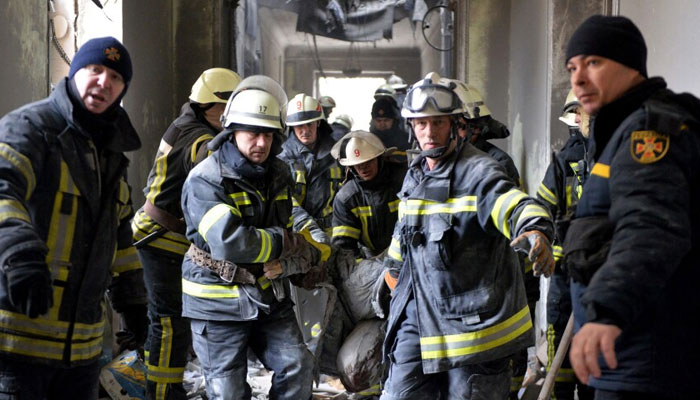 This representational picture shows firefighters during a rescue operation. — AFP/File