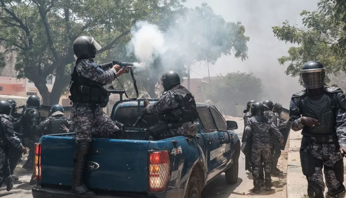 Police fire tear gas at supporters of opposition leader Ousmane Sonko in Dakar, Senegal, on June 1, 2023, during unrest following his sentencing to two years in prison. — AFP