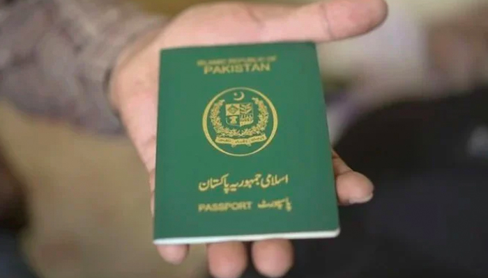 A person holds a Pakistani passport. — AFP/File