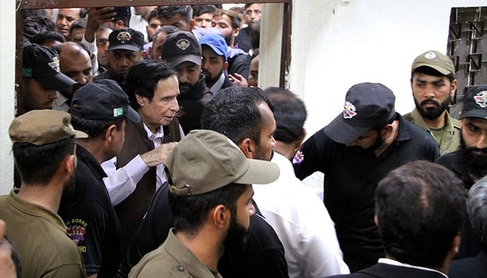 Pakistan Tehreek-e-Insaf (PTI) President Chaudhry Parvez Elahi leaving court after court case hearing, at District Court in Lahore on Friday, June 2, 2023. — PPI