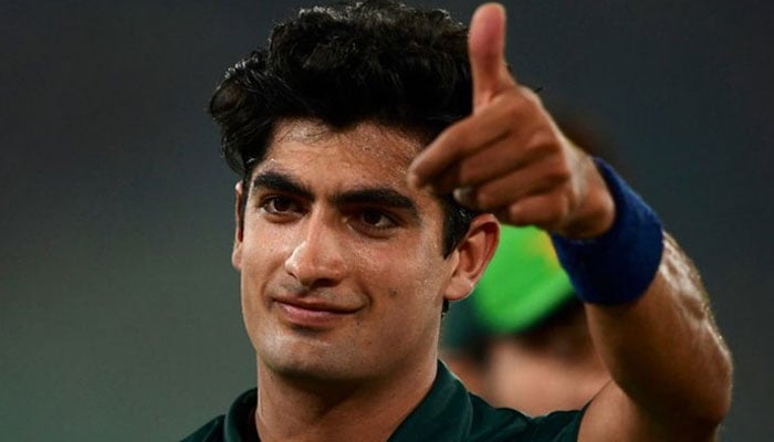 Naseem Shah celebrates after he took five wickets during the first one-day international (ODI) cricket match against New Zealand at the National Stadium in Karachi on January 9, 2023. — AFP