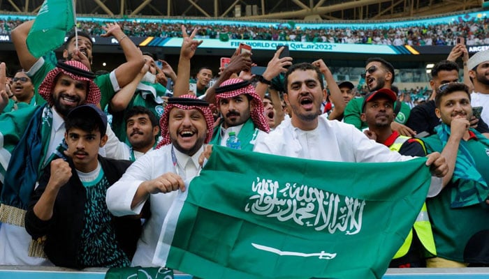 Saudi Arabia fans celebrate their teams victory over Argentina 2-1 during the Qatar 2022 World Cup football at Lusail Stadium, 22 November 2022. — AFP