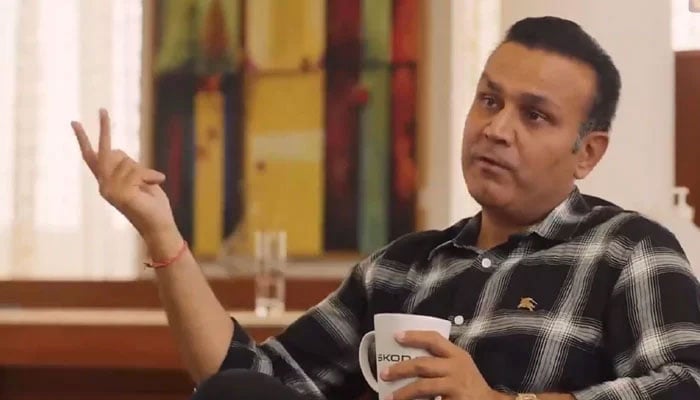 Former Indian Test cricketer Virender Sehwag speaking during an interview in this still taken from a video on June 5, Monday. — Twitter/@_FaridKhan