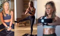 Jennifer Aniston puts her chiseled abs, ageless figure on display in new workout video