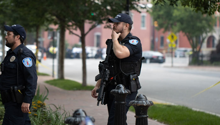 Police personnel can be seen in Richmond, Virginia at Monroe Park after a mass shooting at a graduation ceremony on June 6, 2023. — Twitter/zyndoa