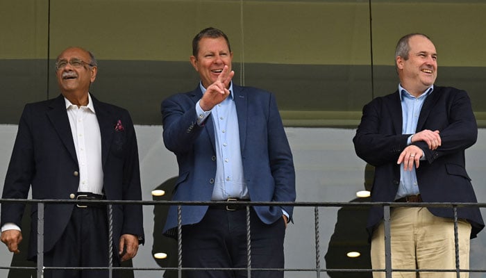 International Cricket Council (ICC) Chairman Greg Barclay (R) and ICC CEO Geoff Allardice (C) visit the Gaddafi Stadium along with Pakistan Cricket Board Chairman (PCB) Najam Sethi (L) in Lahore on May 30, 2023. — AFP