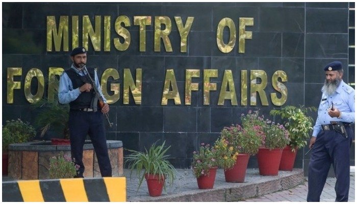Policemen stand outside the Ministry of Foreign Affairs in Islamabad. — AFP/File