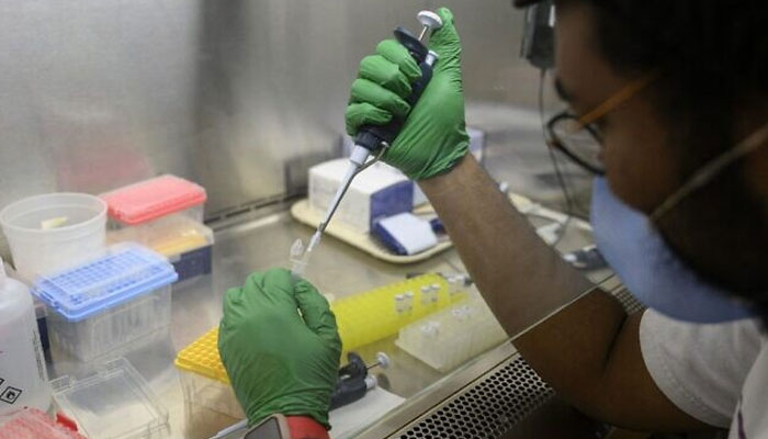 A research assistant prepares a PCR reaction for polio at a lab at Queens College on August 25, 2022, in New York City. — AFP/File