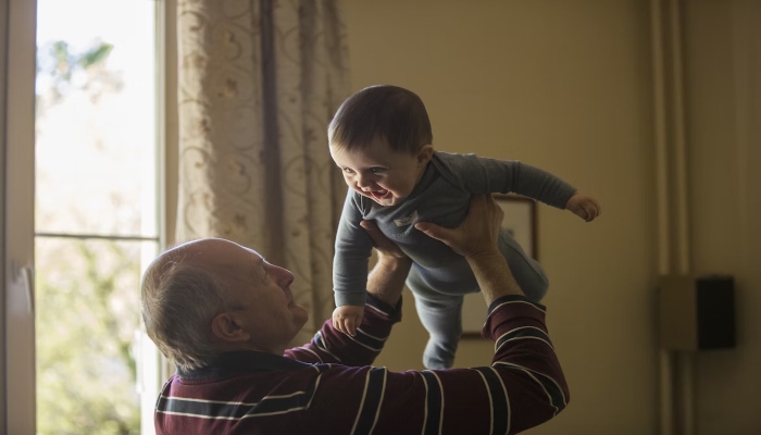 This representational picture shows a grandfather playing with his grandchild. — Unsplash/File