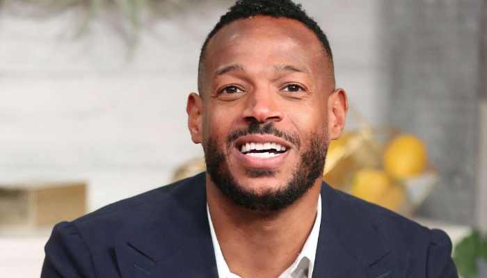 Marlon Wayans says that he was picked on after consolidating his bags at the request of the agent