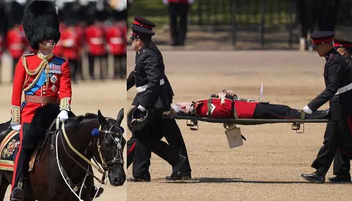 Prince William reacts as three troops faint during royal military parade