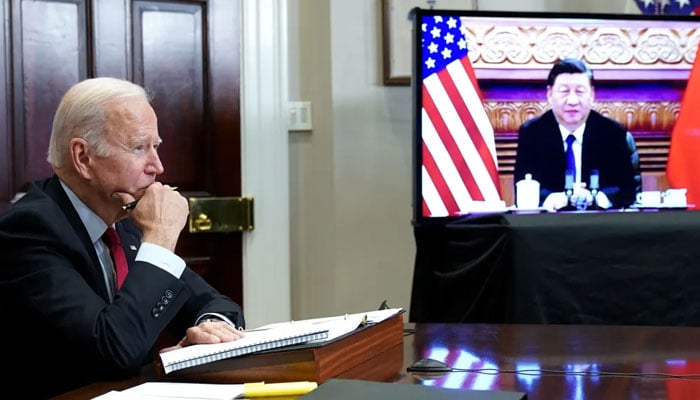 President Joe Biden meets virtually with Chinese President Xi Jinping on Nov. 15. AFP/File