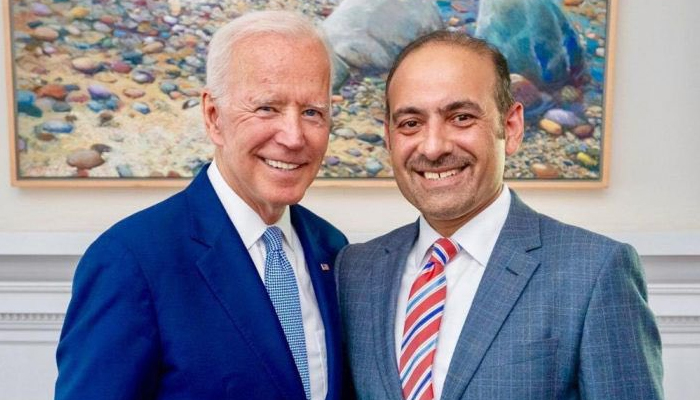 US President Joe Biden (left) poses for a photograph with Pakistani-American businessman Dilawar Syed. — Twitter/@SenatorCardin