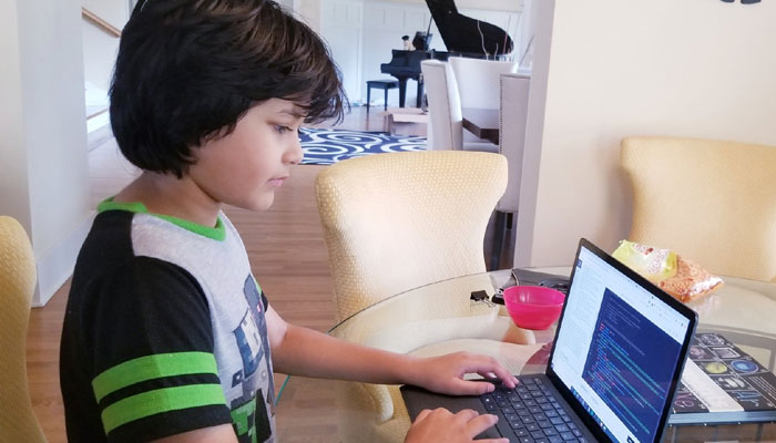 This picture shows Kaira Quazi, Starlinks youngest recruit busy with work. — Instagram/@thepythonkairan