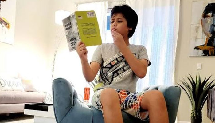 This picture shows, Kairan Quazi, 14, enjoying a book in his spare time. — Instagram/@thepythonkairan