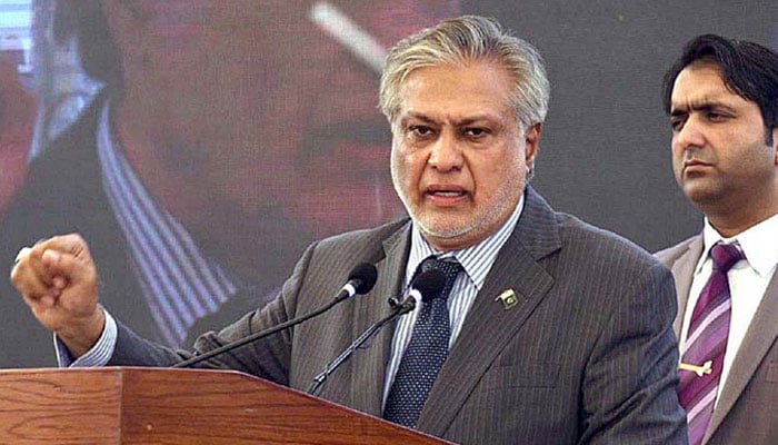 Finance Minister Ishaq Dar addressing a conference in this undated picture. — APP/File