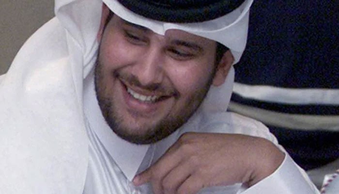 In this file photo taken on October 22, 2001, Sheikh Jassim Bin Hamad Bin Jassim Bin Jaber al-Thani, the then president of Qatar´s Al-Sadd soccer club, listens on during the draw for the 17th Emir Faisal bin Fahad Arab Championship League, in Doha. — AFP