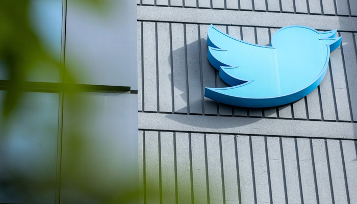In this file photo taken on October 28, 2022 the Twitter logo is seen on a sign on the exterior of Twitter headquarters in San Francisco, California. — AFP