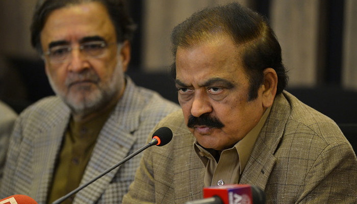 Interior Minister Rana Sanaullah, centre, speaks during a press conference in Islamabad on May 24, 2022. — AFP