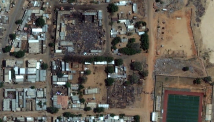 A satellite photo shows the burned-out market area of El Geneina in Sudans West Darfur state. AFP/Satellite image
