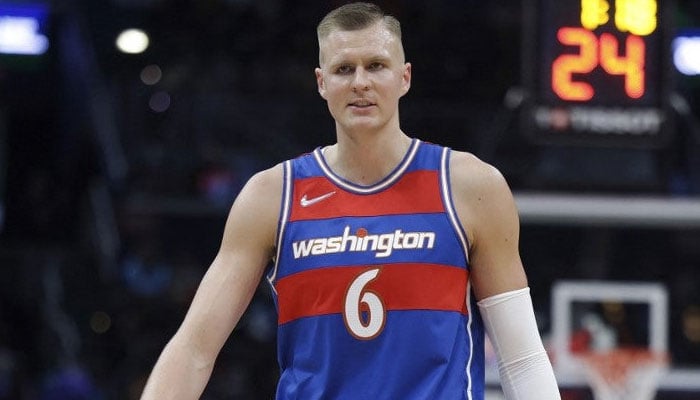 Kristaps Porzingis #6 of the Washington Wizards walks on the court against the Golden State Warriors at the Capital One Arena on March 27, 2022 in Washington, DC. AFP/File