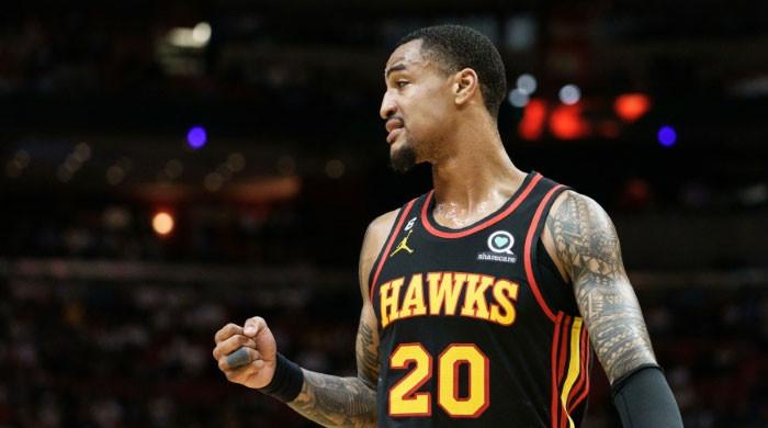 Hawks clear cap room, trade Collins to Jazz for Gay, future 2nd rounder, AP  source says