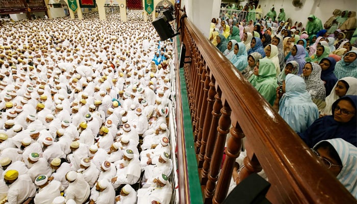 Worshippers attend a ceremony led by Syedna Mufaddal Saifuddi, the head of the Dawoodi Bohra community,in Kuwait City, on September 24, 2022. — AFP