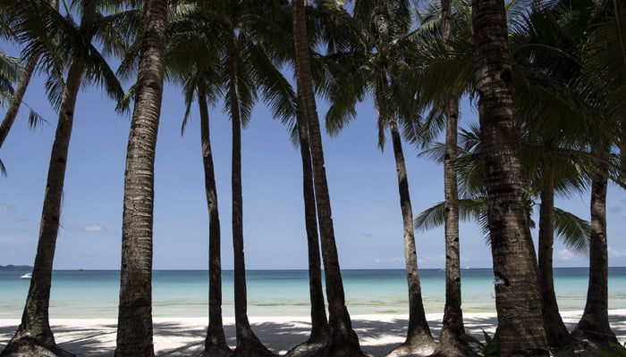 A general view of an empty beach on the Philippine island of Boracay, April 26, 2018. — AFP