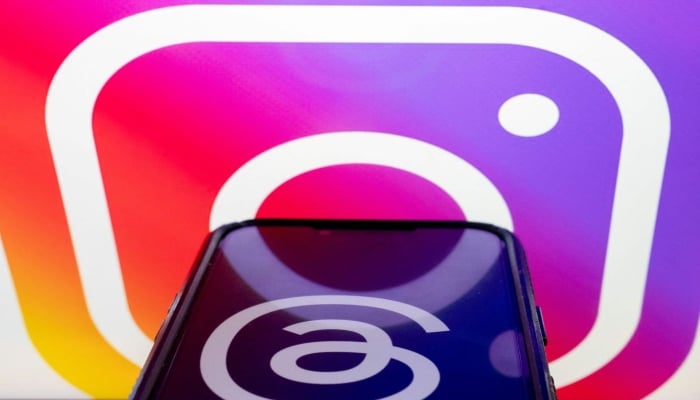 This representational picture shows a smartphone displaying Threads logo against Instagram logo. — AFP/File