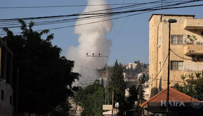 Smoke billows following an Israeli airstrike in the occupied West Bank city of Jenin on July 3, 2023. — AFP