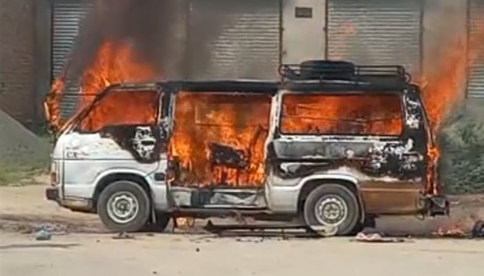 Van engulfed in flames after explosion seen in this screengrab of a video filmed on site of incident in Sargodha, on June 8, 2023. — Reporter